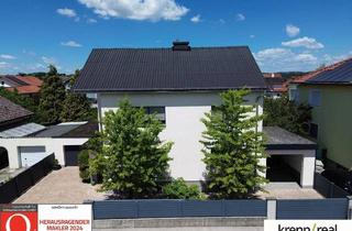 Haus kaufen in 4600 Wels, Einziehen und wohlfühlen – Zweifamilienhaus mit Pool und Traumgarten