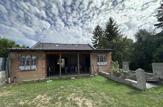 Haus kaufen in 2123 Hautzendorf, 2123 Hautzendorf Traumgrundstück mitten im Ort mit Bungalow im Rohbau