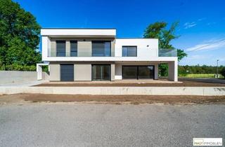 Einfamilienhaus kaufen in 2231 Strasshof an der Nordbahn, Modernes 5-Zimmer-Einfamilienhaus mit 154,81 m² Wohnfläche, Garten & Garage in Bahnhofsnähe