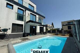 Villen zu kaufen in 2380 Perchtoldsdorf, Luxus Leben auf Easy Mode! Pool, Garten, Dachterrasse