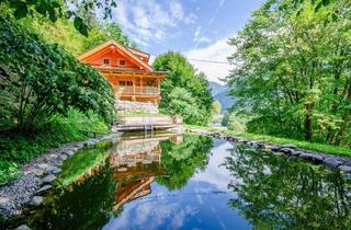 Haus kaufen in 9753 Kleblach, WO DAS BESONDERE ZUHAUSE IST - EXKLUSIVES RUNDHOLZ-CHALET IN TRAUMHAFTER NATURKULISSE!