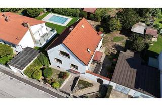 Einfamilienhaus kaufen in 2103 Langenzersdorf, Einfamilienhaus mit Werkstatt, zwei Garagen und großem Garten — direkt an der Wiener Stadtgrenze. Pachtgrund.