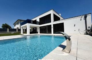 Villen zu kaufen in Högerstraße, 2432 Schwadorf, Moderne Villa mit Pool