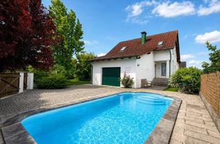 Einfamilienhaus kaufen in 3385 Markersdorf an der Pielach, *** Ein Wohntraum mit Urlaubsgefühl: Traumhaft gepflegtes Einfamilienhaus mit Pool, Gartenidylle, Specksteinofen, Wasser-Wasserwärmepumpe mit Fußbodenheizung in Top-Lage ***