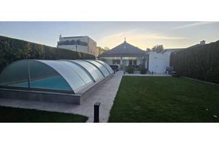 Haus kaufen in 1220 Wien, Modernes Wohnjuwel in Bestlage: Generalsanierter Bungalow mit Pool-Oase