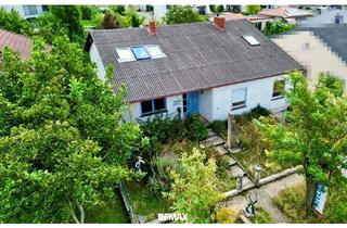 Haus kaufen in 7132 Frauenkirchen, Ort der Kreativität - Ein Haus umgeben von Sandstein und viel Grün.