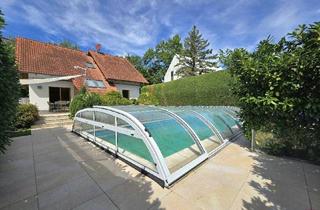 Haus kaufen in 2511 Pfaffstätten, Exklusive Wohlfühlresidenz mit zwei Häusern und Pool