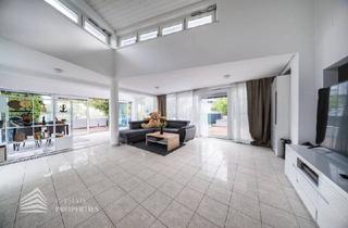 Einfamilienhaus kaufen in 2325 Himberg, Elegantes Einfamilienhaus am See mit großzügiger Terrasse und Garten
