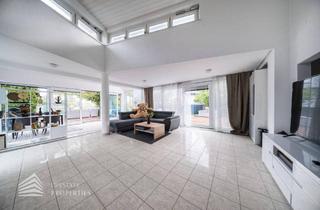 Einfamilienhaus kaufen in 2325 Himberg, Elegantes Einfamilienhaus am See mit großzügiger Terrasse und Garten