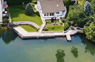 Einfamilienhaus kaufen in 2491 Steinbrunn, Uferparzelle am Privatsee mit 165 m² Einfamilienhaus in absoluter Ruhelage
