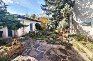 Wohnung kaufen in 1230 Wien, Altbau-Charme mit Gartenidylle