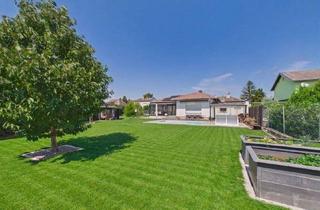 Haus kaufen in 2292 Stopfenreuth, Moderner Bungalow mit Pool, Garage und Traumgarten – Nähe Bratislava, Wien