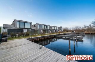 Wohnung kaufen in 7100 Neusiedl am See, Am Segelhafen West: 2-Zimmer-Wohnung mit Eigengarten, Wasserblick & 39-m²-Wohnküche