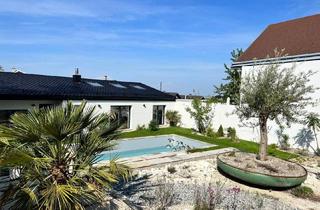 Villen zu kaufen in 7072 Mörbisch am See, TRAUMHAFTE LIEGENSCHAFT MIT POOL, SEEBLICK UND ÜBERDACHTER BOOTSGARAGE
