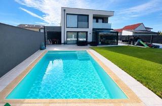 Villen zu kaufen in 2100 Stetten, Traumvilla- Exklusives Wohnen mit Pool und Wintergarten