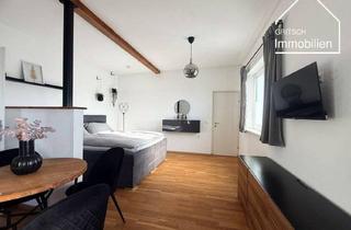 Wohnung kaufen in 6068 Mils, MILS - Charmante Garçonnière mit großer Terrasse und eigenem Zugang